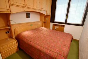 A bed or beds in a room at Maso 21