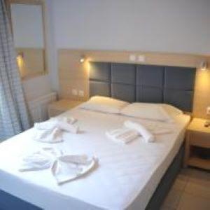 Кровать или кровати в номере Irene ROOMS & STUDIOS PETRA