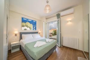 Postel nebo postele na pokoji v ubytování Ilias Apartments