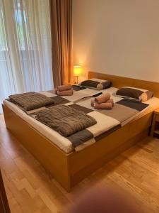 Кровать или кровати в номере Golden Fox Apartment Pohorje