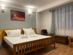 Postel nebo postele na pokoji v ubytování Mellow Fellow Hostel