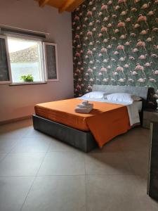 Katil atau katil-katil dalam bilik di Profumo di Zagara