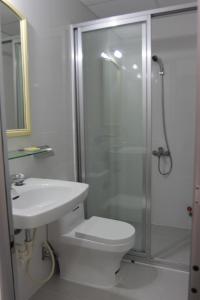a bathroom with a shower and a toilet and a sink at QUANG SAIGON Hotel- 40-7 Bùi Viện-Walking street in Ho Chi Minh City