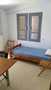 Ένα ή περισσότερα κρεβάτια σε δωμάτιο στο Zach's house
