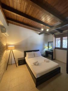 Ένα ή περισσότερα κρεβάτια σε δωμάτιο στο Villa Summer Breeze