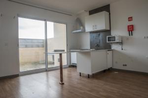 Kuchyň nebo kuchyňský kout v ubytování GarçaView + 33 fotografií