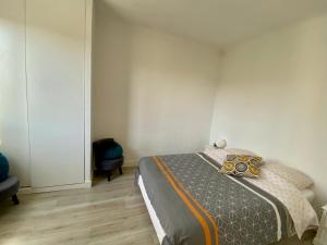 Postel nebo postele na pokoji v ubytování Magnifique appartement devant la plage