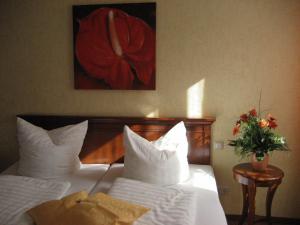 Postel nebo postele na pokoji v ubytování Altstadthotel Schex + 7 fotografií