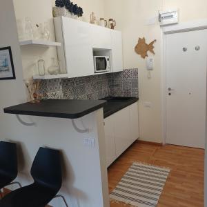 Køkken eller tekøkken på Loggia Portofino