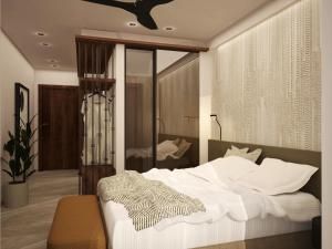 um quarto com uma cama grande e um espelho em Assano Seafront Luxury em Nikiti