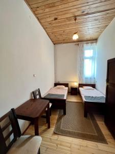 Posteľ alebo postele v izbe v ubytovaní Cicha Dolina