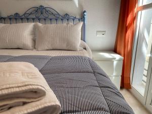 Posteľ alebo postele v izbe v ubytovaní Apartamento Duplex El Tinte