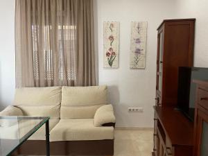 Posedenie v ubytovaní Apartamento Duplex El Tinte