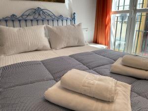 Posteľ alebo postele v izbe v ubytovaní Apartamento Duplex El Tinte