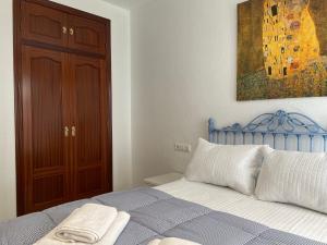 Posteľ alebo postele v izbe v ubytovaní Apartamento Duplex El Tinte