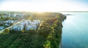 an island in the middle of a large body of water at Apartament TOLA in Puck +1 photo