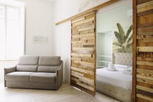 Postel nebo postele na pokoji v ubytování Apartments Chic Torino Centro porta nuova