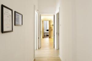 Postel nebo postele na pokoji v ubytování Apartments Chic Torino Centro porta nuova