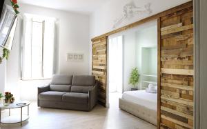 Postel nebo postele na pokoji v ubytování Apartments Chic Torino Centro porta nuova