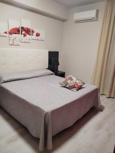 Postel nebo postele na pokoji v ubytování Hotel Casale dei Greci