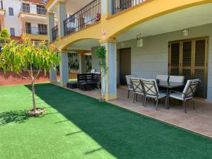 Zahrada ubytování Apartamento con jardín privado y acceso a piscina