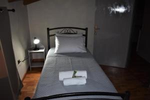 Postel nebo postele na pokoji v ubytování PIGADIA