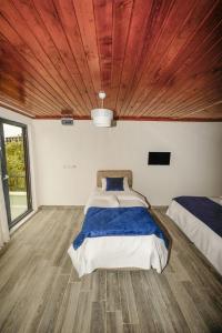 Postel nebo postele na pokoji v ubytování Assos No9 Hotel