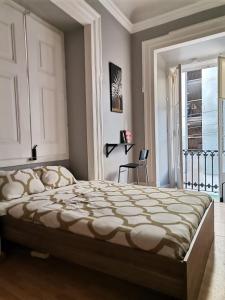 a bedroom with a large bed and a window at Party Zone in Lisbon +117 photos