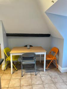 a table and chairs in a room at Elizabeth Clark in Manningtree