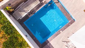 Фотография из галереи Thronos Aqua Appartment 1 в городе Пахия Аммос