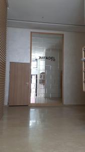 an empty room with a markedel sign on a door at Du Haut Standing au coeur du Parc et Plage à 180 m in Mohammedia