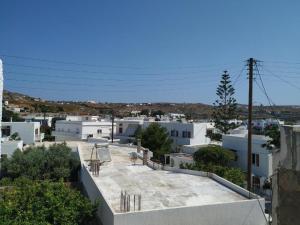 a view of a city from the top of a building at Blue Rooms in Adamantas