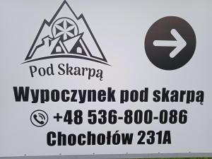 ein Schild für den Pool sharapa wolfgangpod skyrimichhovpod sl in der Unterkunft Wypoczynek Pod Skarpą in Chochołów
