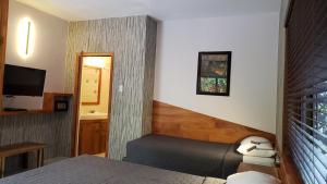 Sjónvarps- og/eða afþreyingartæki á Sunrise Club Hotel
