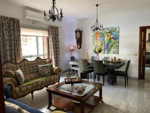 a living room with a couch and a table at Casa Charry in Tegueste