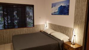 Rúm í herbergi á Sunrise Club Hotel