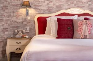 Postel nebo postele na pokoji v ubytování La Concordia - Boutique Hotel