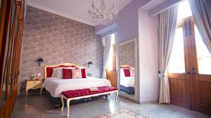Postel nebo postele na pokoji v ubytování La Concordia - Boutique Hotel