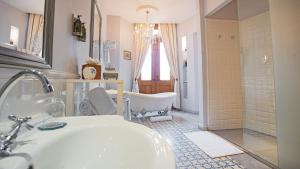 Koupelna v ubytování La Concordia - Boutique Hotel