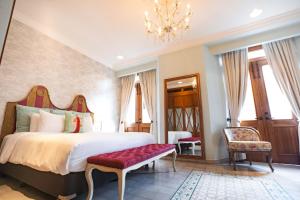 Postel nebo postele na pokoji v ubytování La Concordia - Boutique Hotel