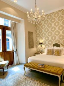 Postel nebo postele na pokoji v ubytování La Concordia - Boutique Hotel