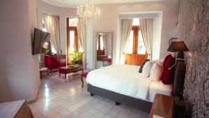 Postel nebo postele na pokoji v ubytování La Concordia - Boutique Hotel