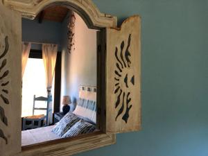 A bed or beds in a room at Amalfatah Tuerredda