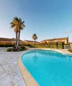 Swimmingpoolen hos eller tæt på Villa du Grand Bleu Odalys