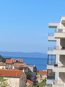 a view of the ocean from a building at Sole in Makarska
