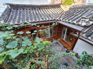 an overhead view of a house with a roof at Seochon Guesthouse in Seoul