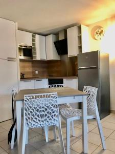 Køkken eller tekøkken på Villa du Grand Bleu Odalys