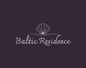 a logo for a restaurant with a shell at BALTIC RESIDENCE in Łeba