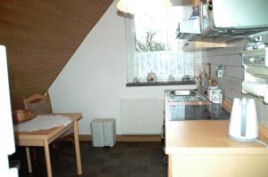 Kuchyň nebo kuchyňský kout v ubytování Ferienwohnung Sonnendeck Spreewald + 8 fotografií