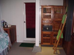 a room with a door leading into a room with a room at Ceningan Cool Breeze Villa in Nusa Lembongan